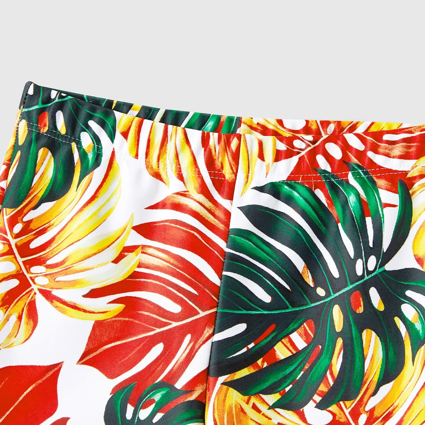 Family Matching Orange and All Over Tropical Plant Print Splicing Ruffle One-Piece Swimsuit and Swim Trunks Shorts
