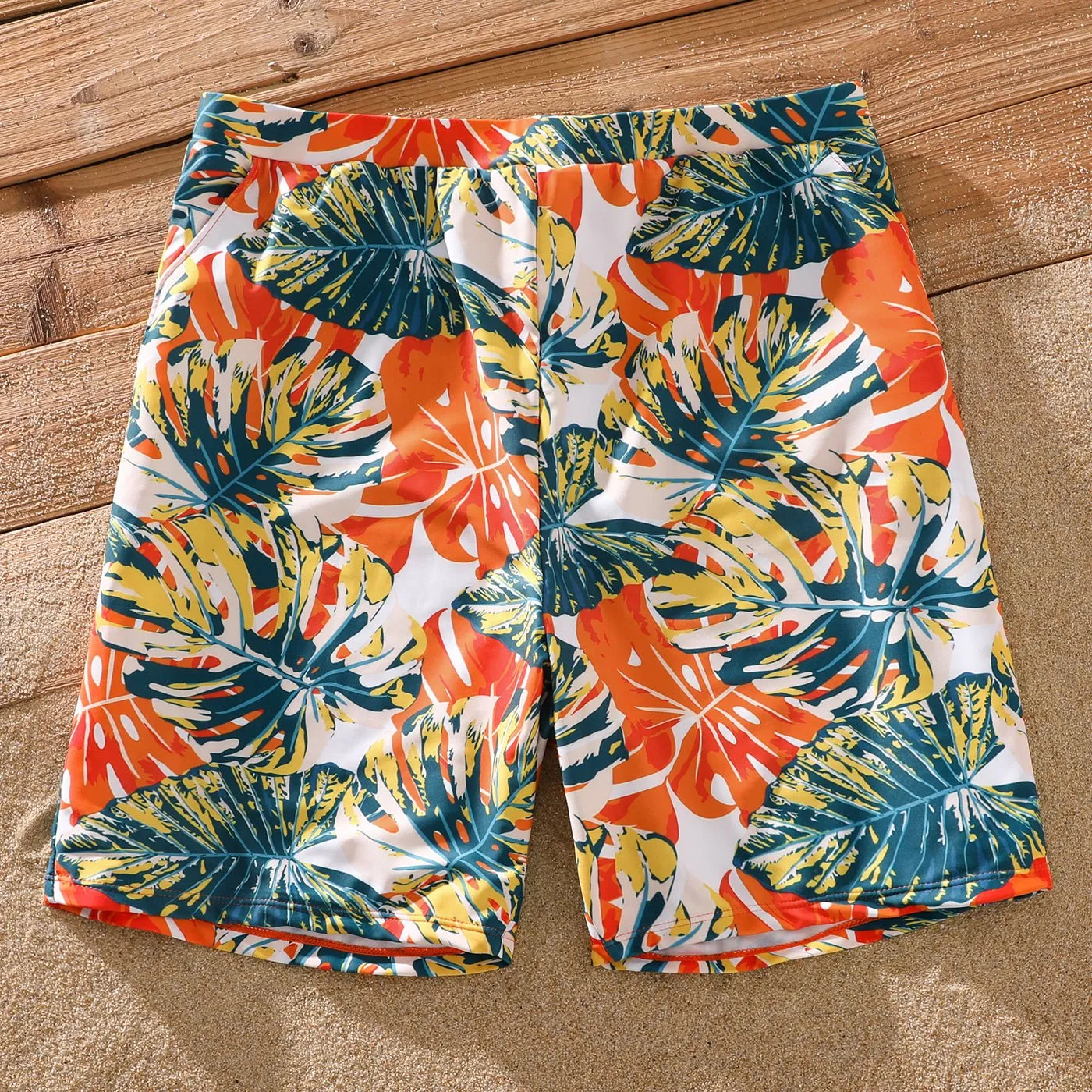 Family Matching Orange and All Over Tropical Plant Print Splicing Ruffle One-Piece Swimsuit and Swim Trunks Shorts