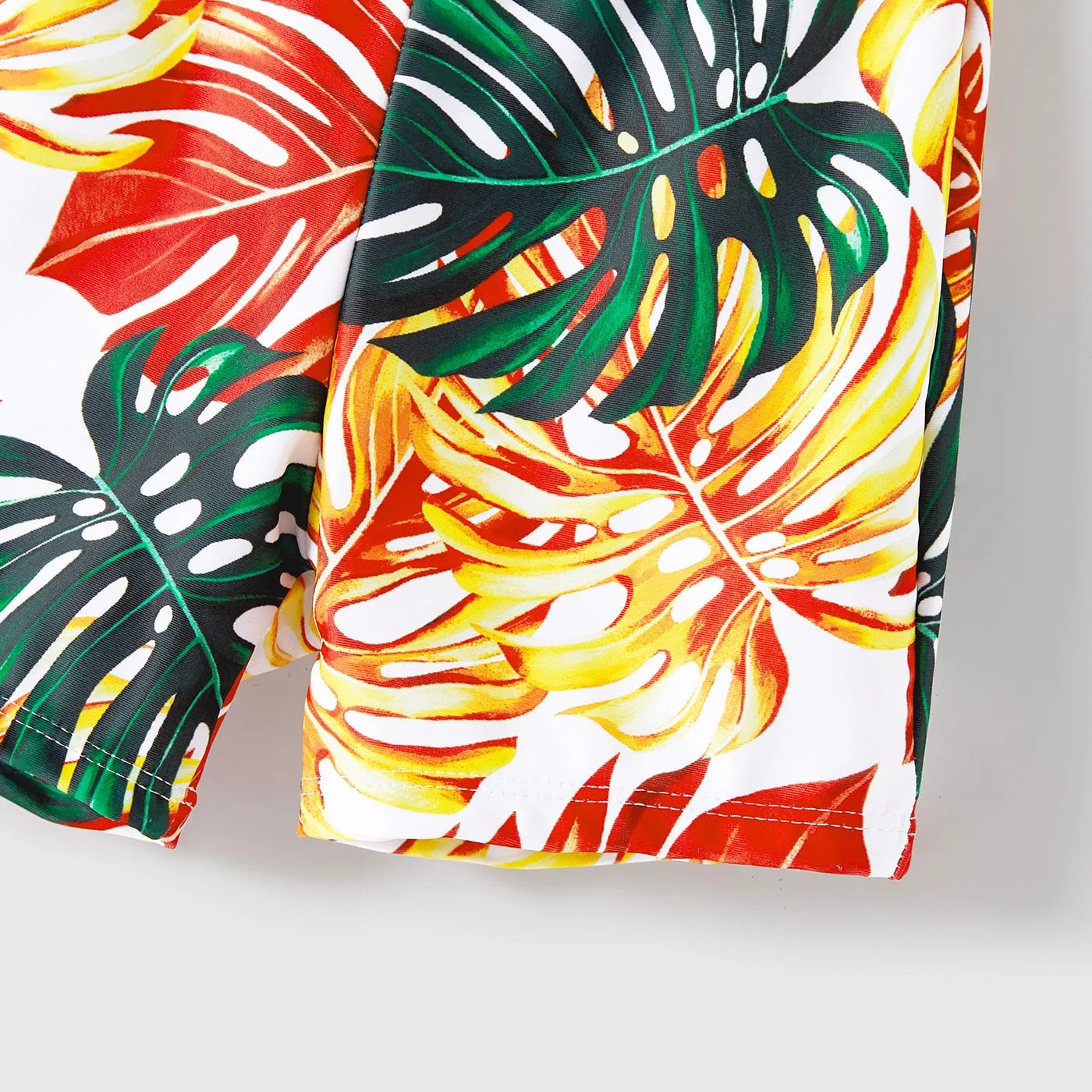 Family Matching Orange and All Over Tropical Plant Print Splicing Ruffle One-Piece Swimsuit and Swim Trunks Shorts