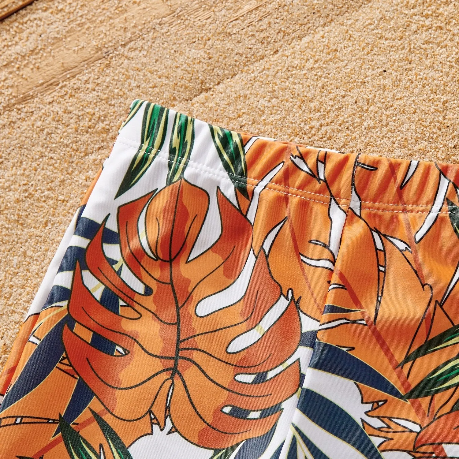 Family Matching Orange and All Over Tropical Plant Print Splicing Ruffle One-Piece Swimsuit and Swim Trunks Shorts