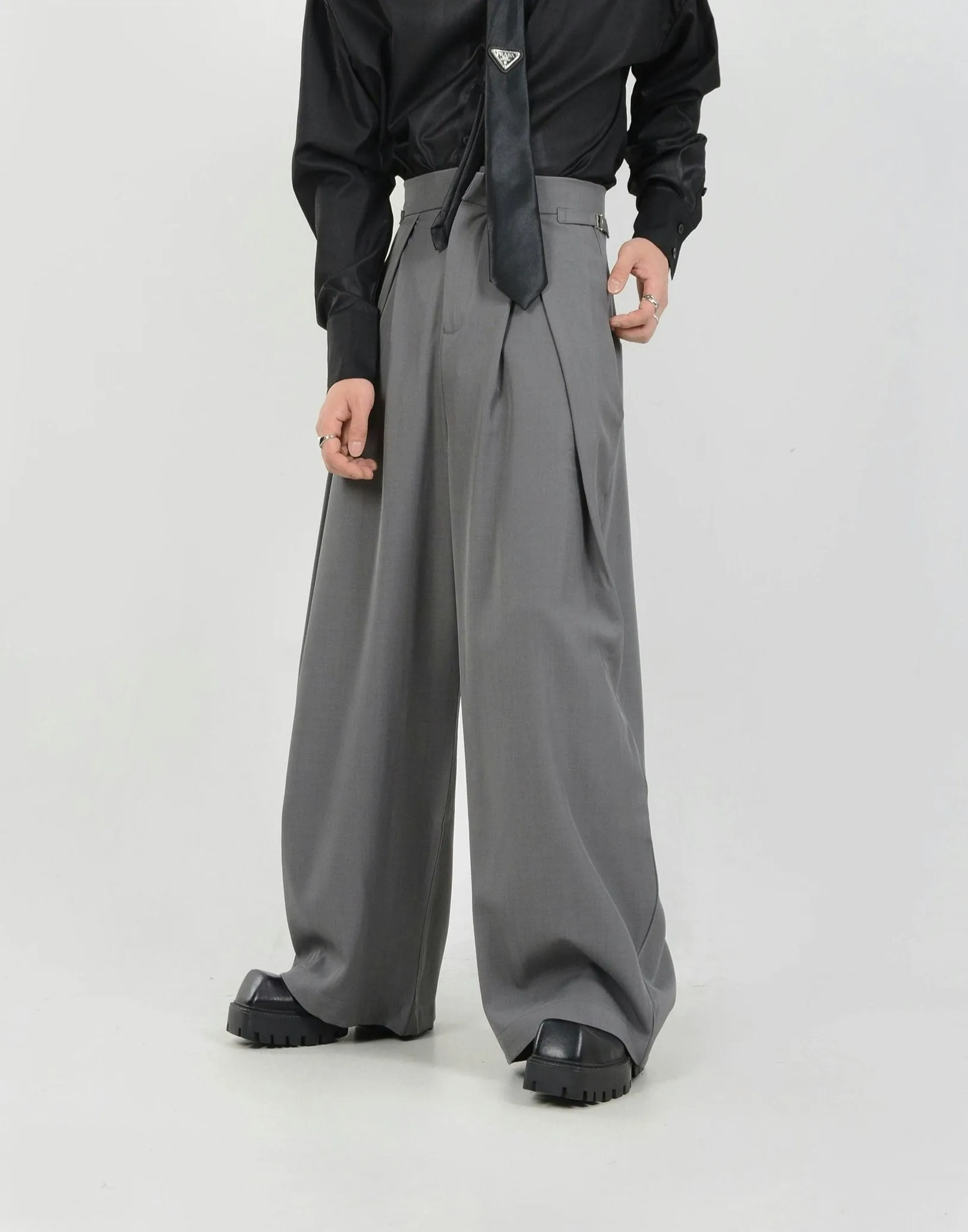 Wide Leg Pleated Palazzo Trousers with Belt Detail