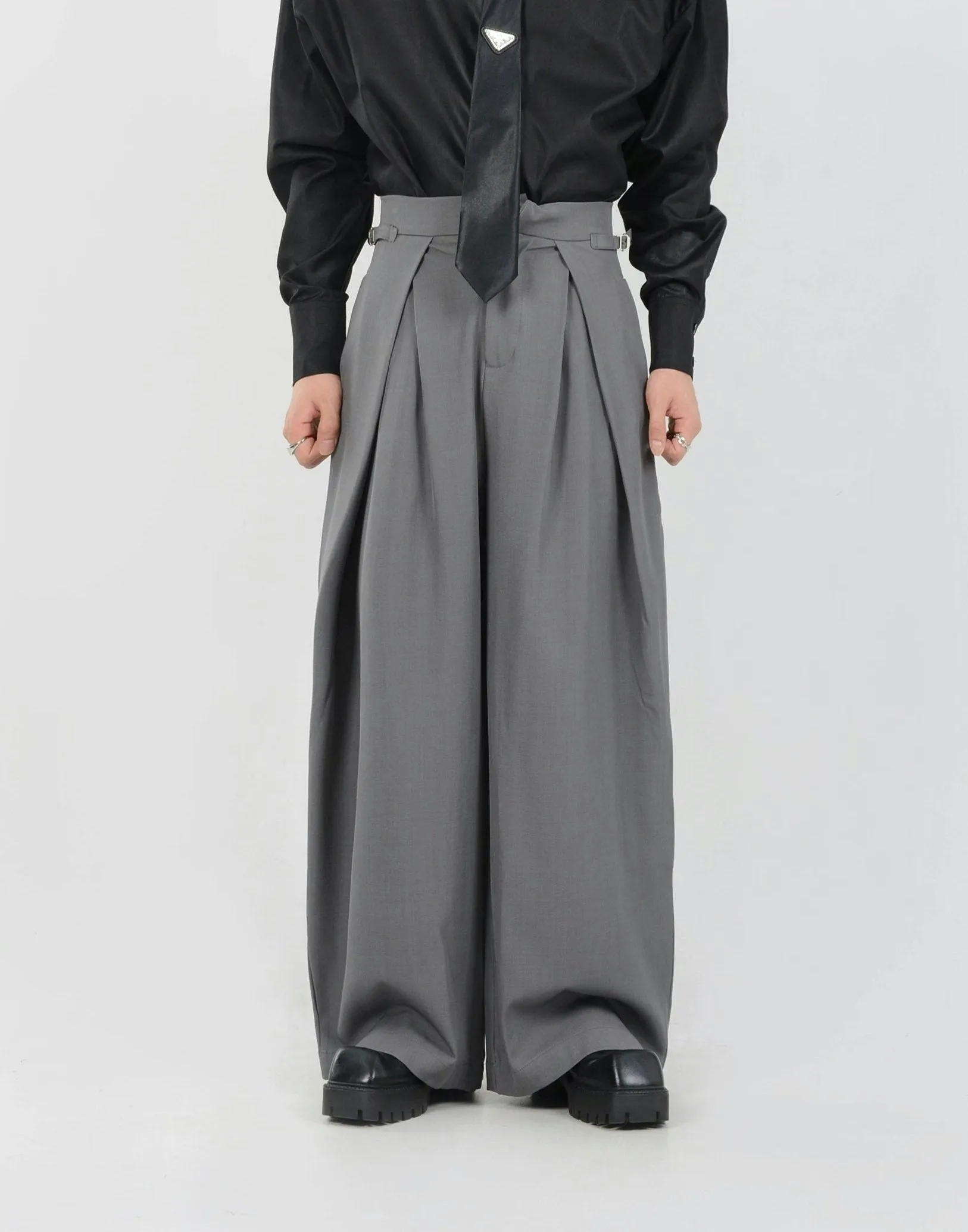 Wide Leg Pleated Palazzo Trousers with Belt Detail