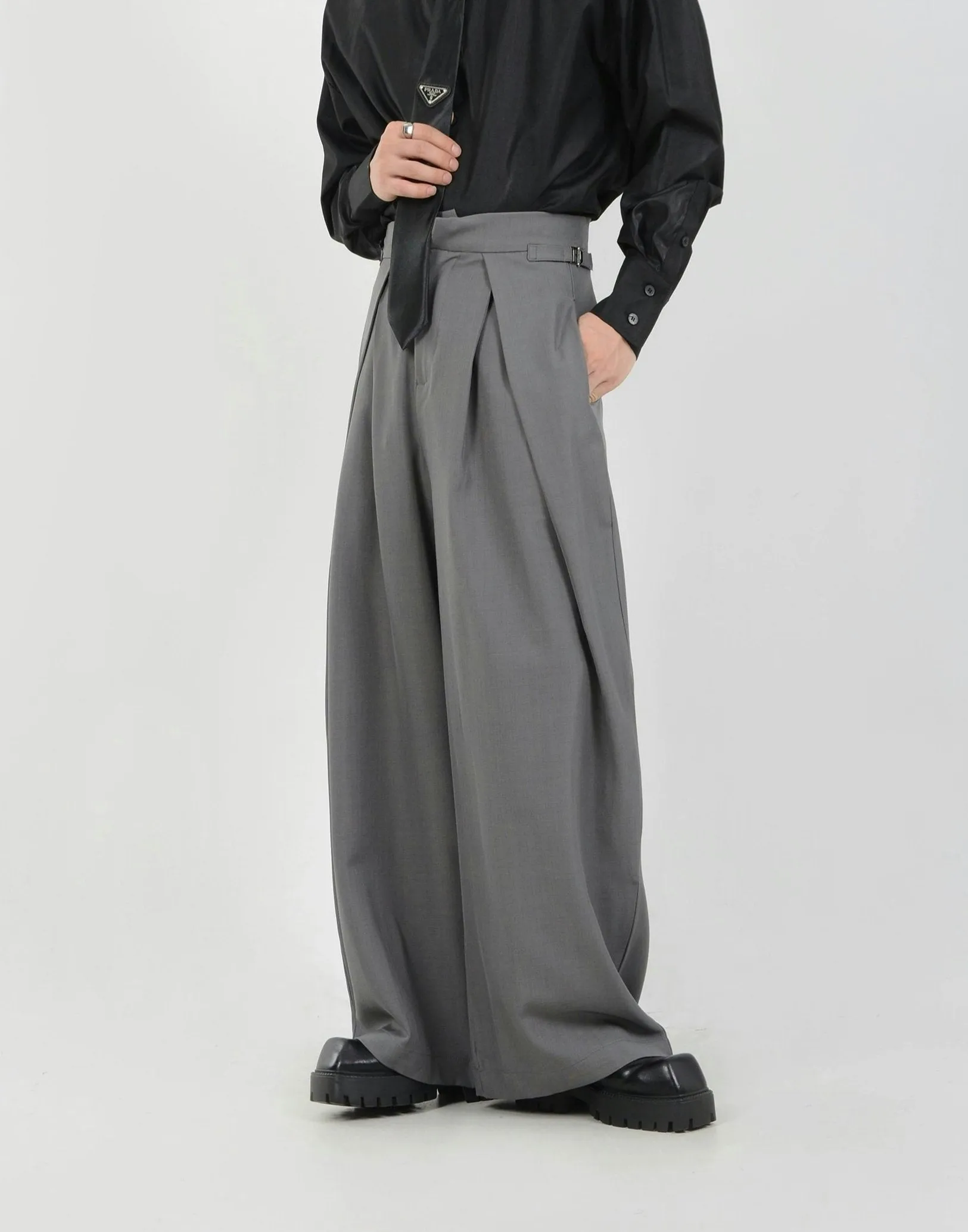 Wide Leg Pleated Palazzo Trousers with Belt Detail